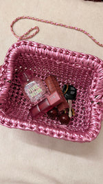 Crocheted metallic clutch