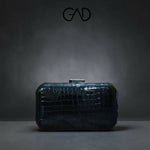 THE CROC LUXE CLUTCH