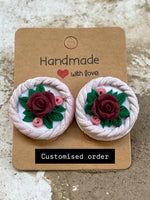 Twisted floral studs