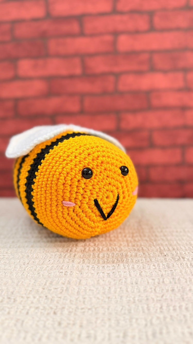 Crocheted honey bee plushie