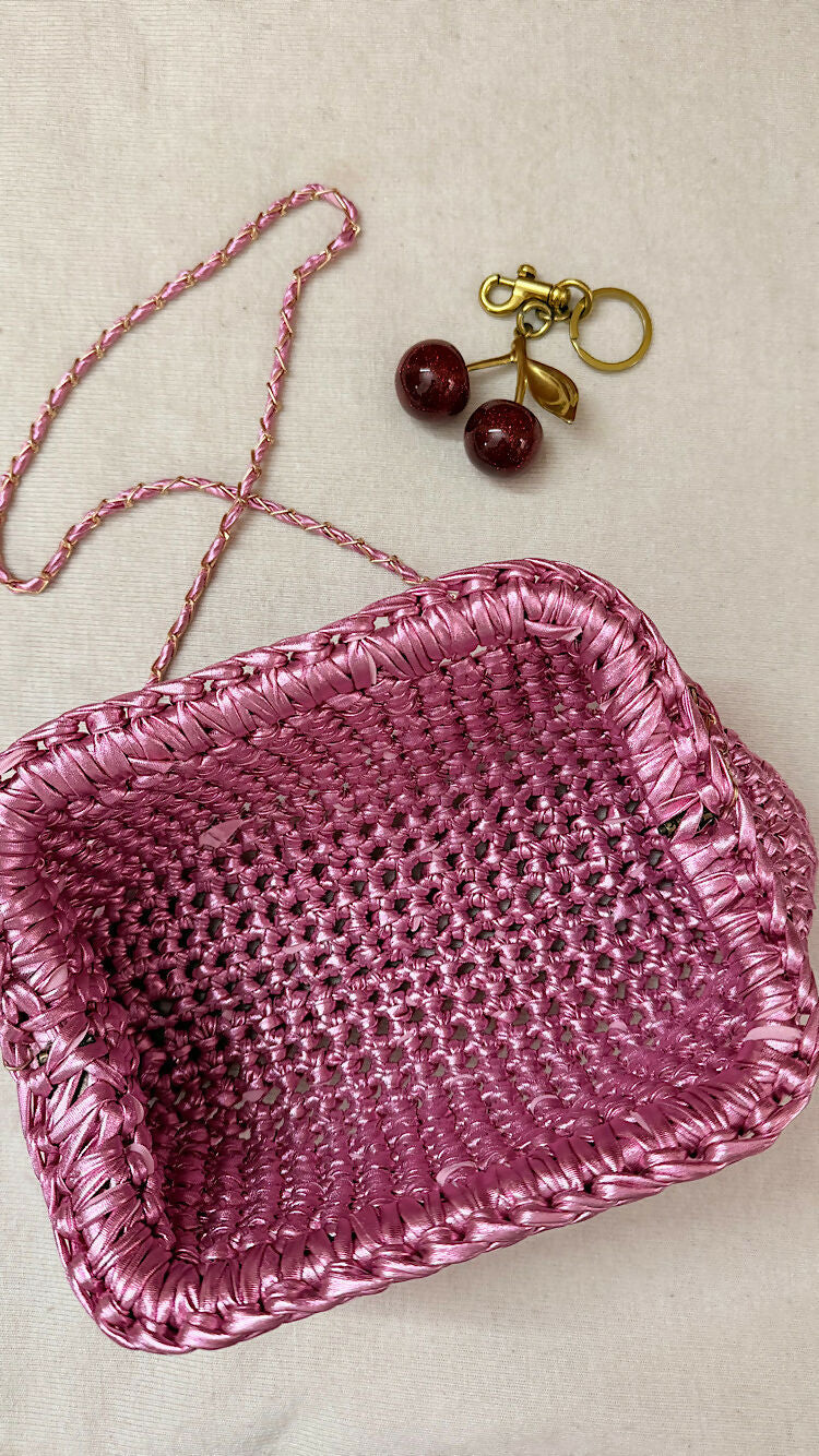 Crocheted metallic clutch