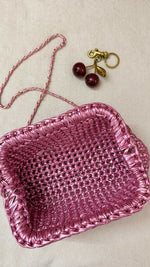 Crocheted metallic clutch