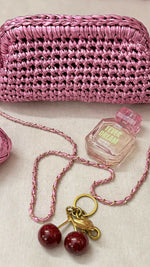 Crocheted metallic clutch