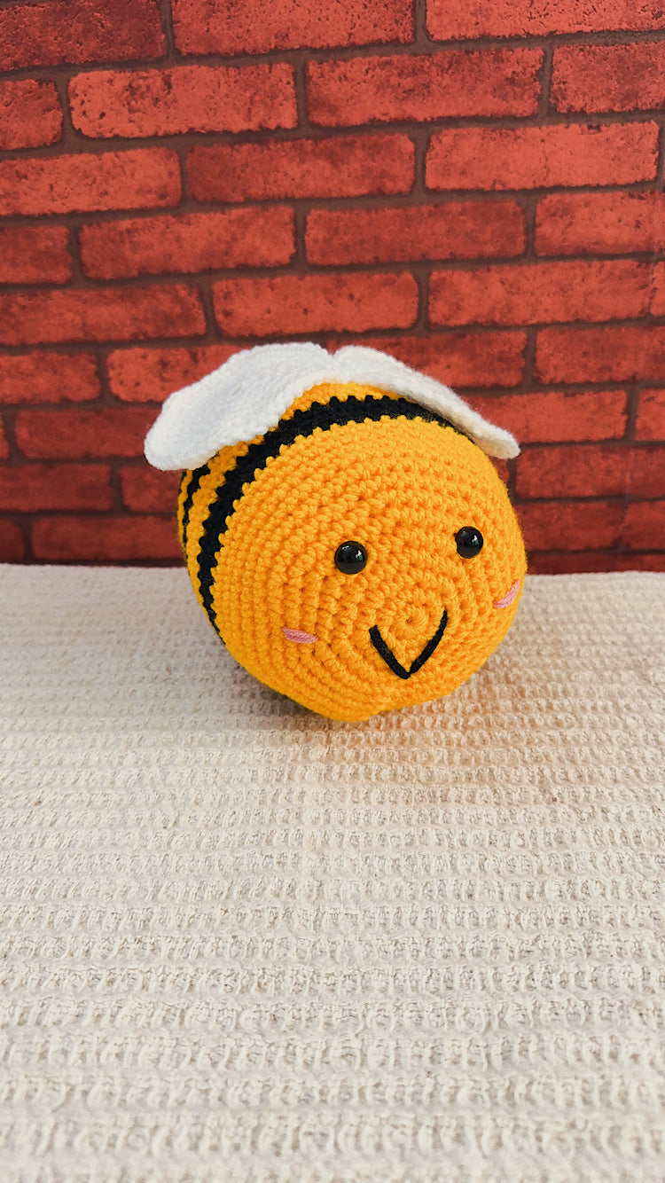 Crocheted honey bee plushie
