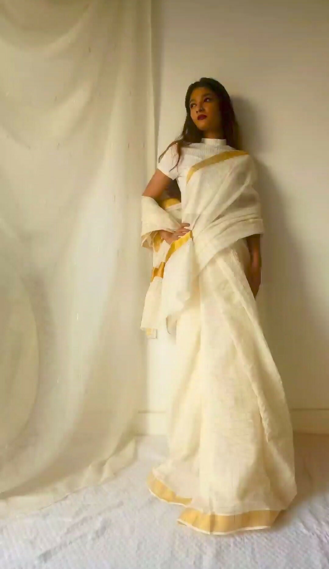 Classic White Saree with golden border